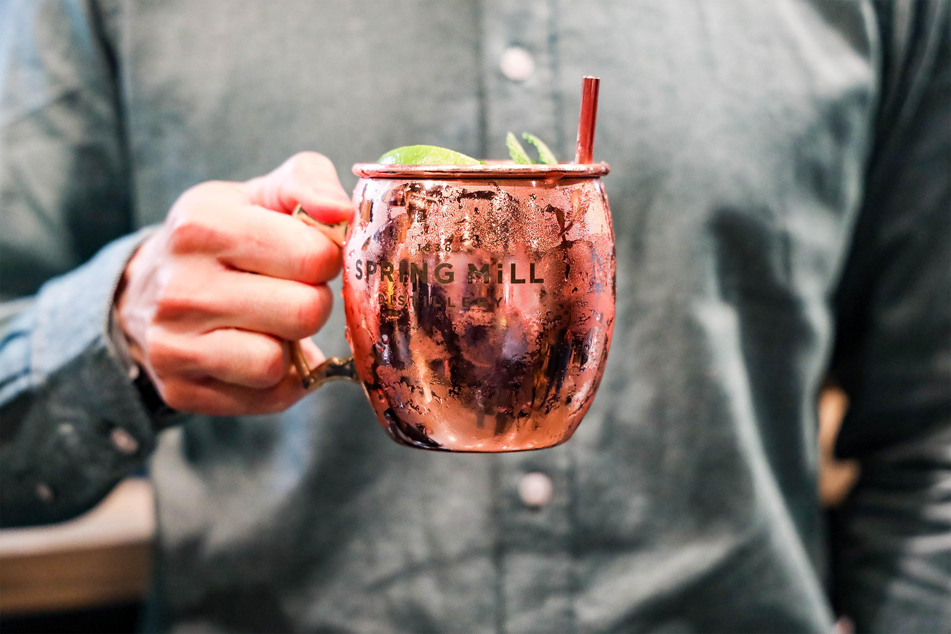 2 stad alone signs for Spring Mill that sit outside a restaurant